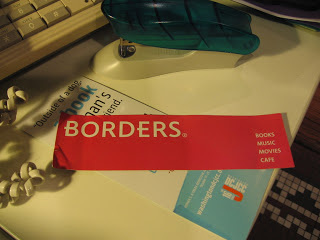Red book mark from Borders bookstore