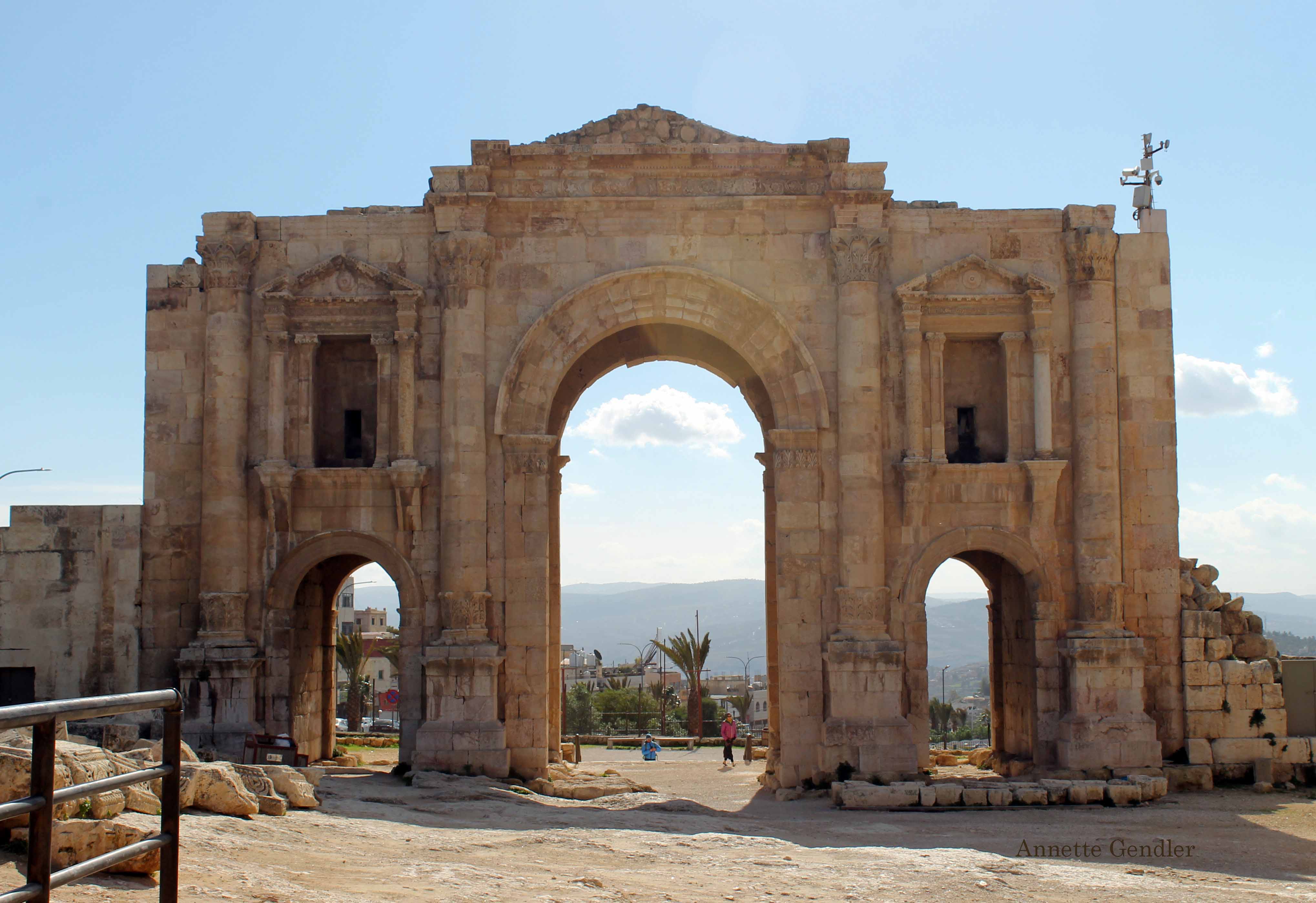 Hadrian's Arch in Jerash, Jordan against a blue sky