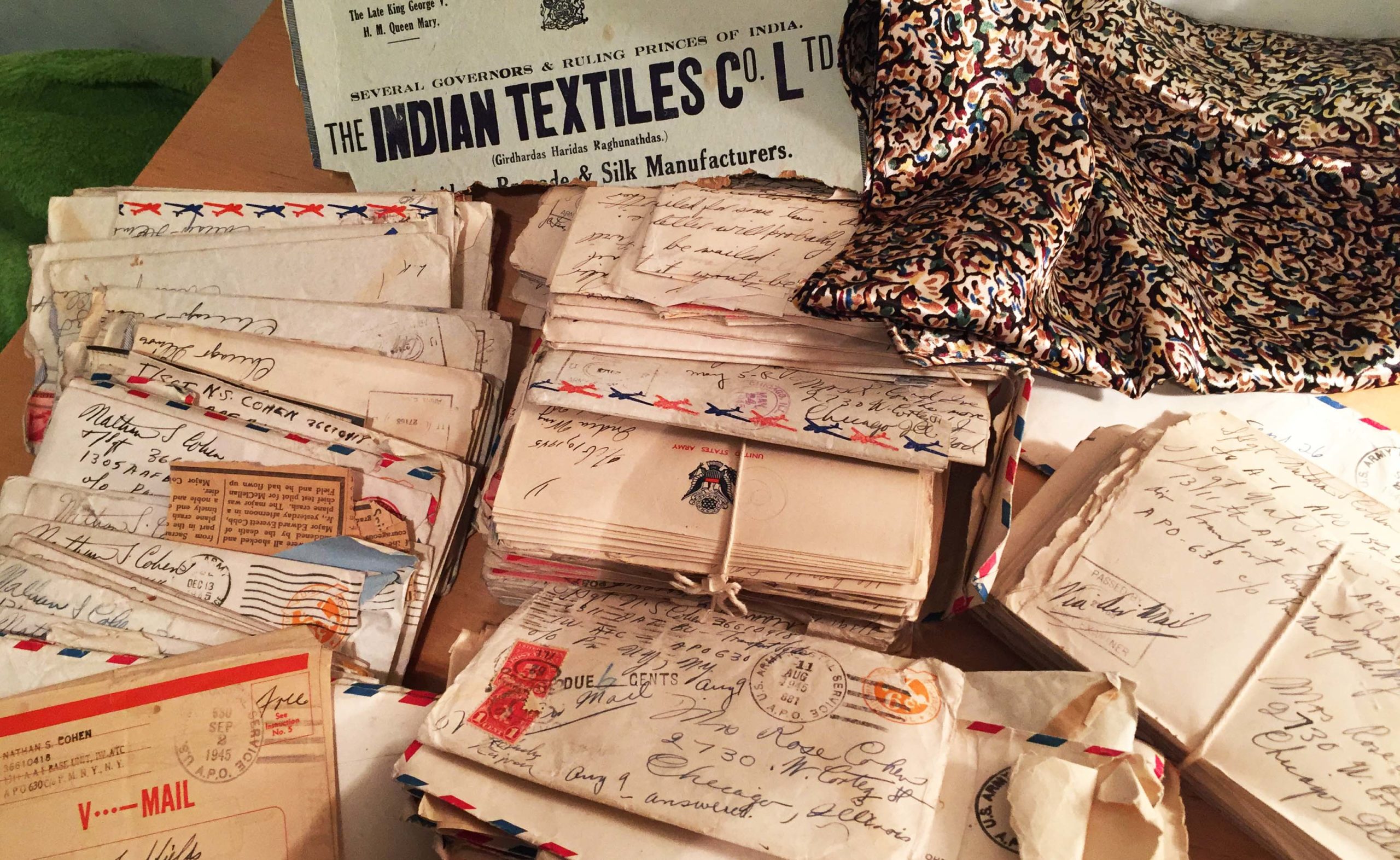pile of family letters with handwritten addresses sent from India to the U.S during WWII
