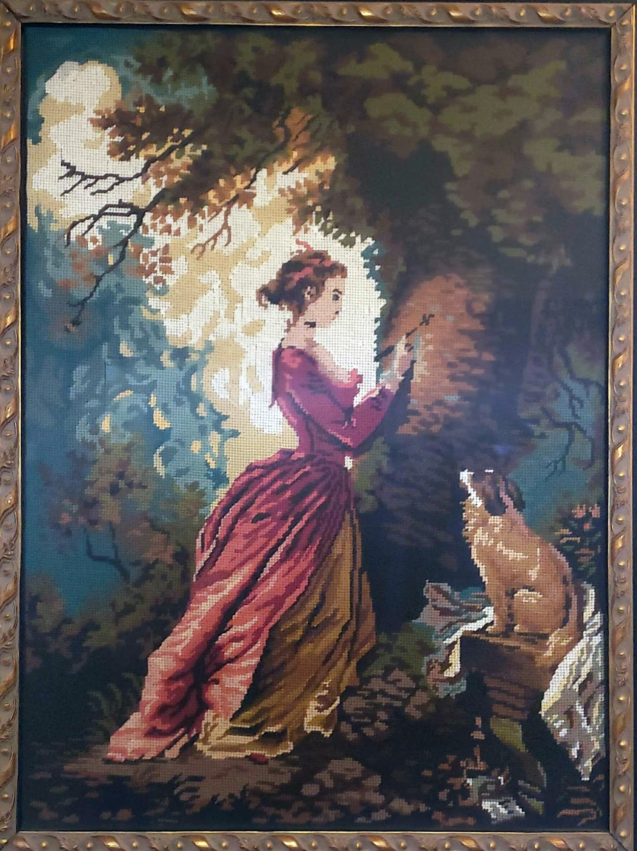 Tapestry of woman in a red dress standing by a tree