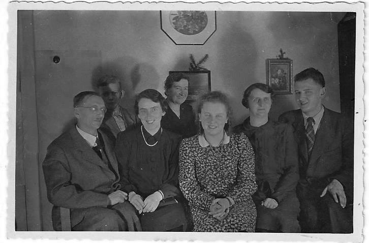 family group picture black and white, dining room, 1940s, Czechoslovakia