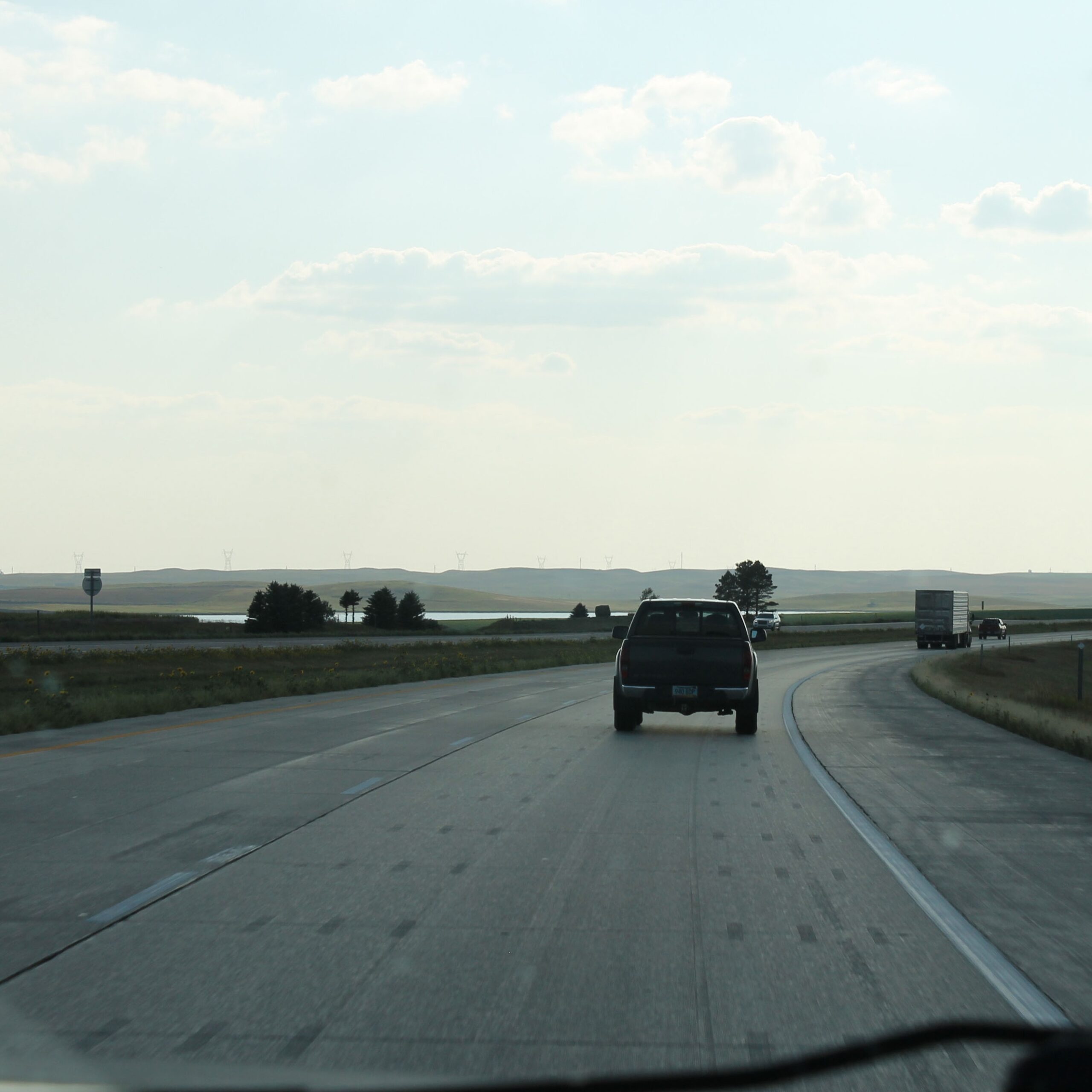 Driving on I-94 in North Dakota, wide open road