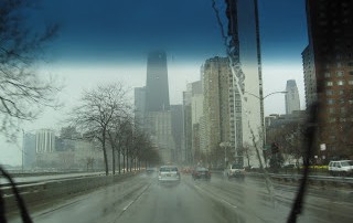 view of driving on Lake Shore Drive in Chicago in the rain